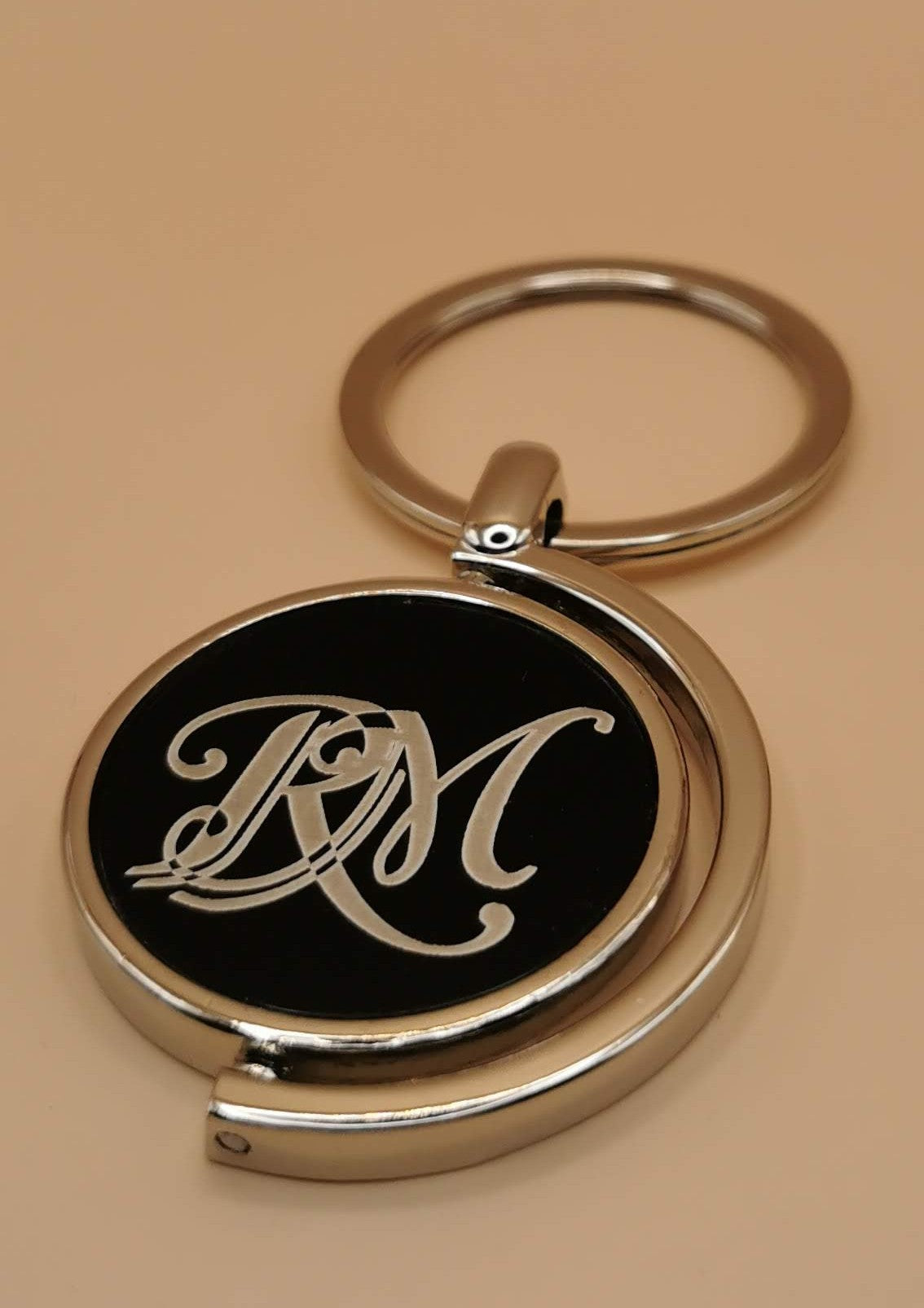Round Black key chain with metal frame - Laser Studio